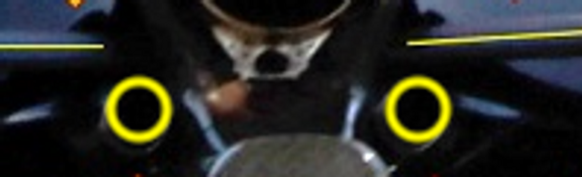 A close up of a steering wheel

Description automatically generated with medium confidence