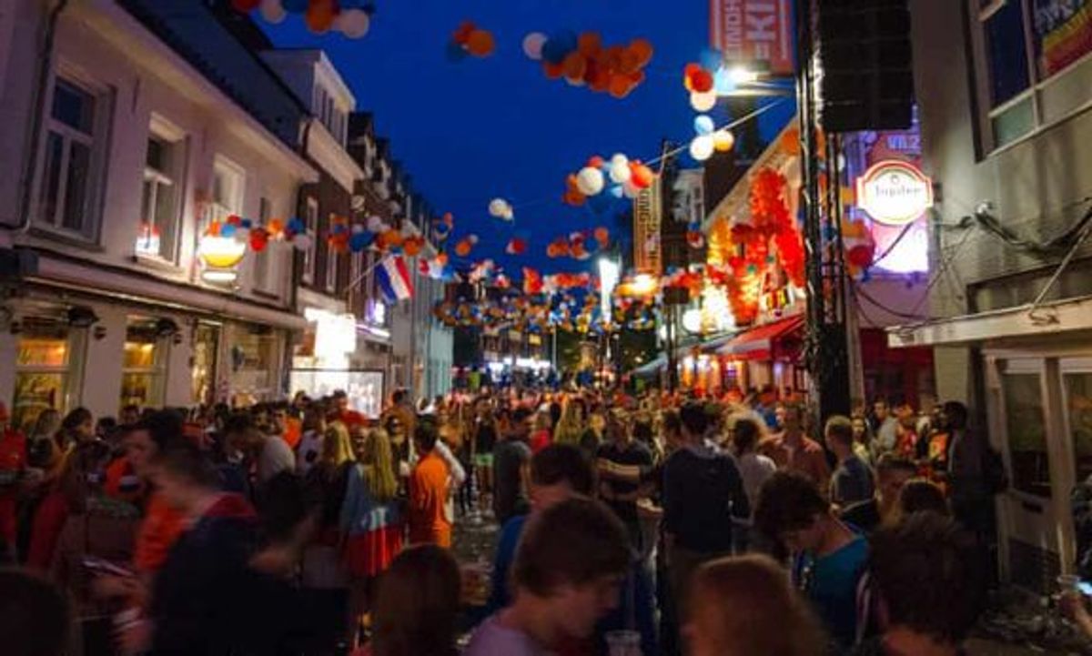 Revellers in Eindhoven’s Stratumseind celebrate King’s Day. Photograph: Filippo Manaresi/ The Gardians Mart 2018