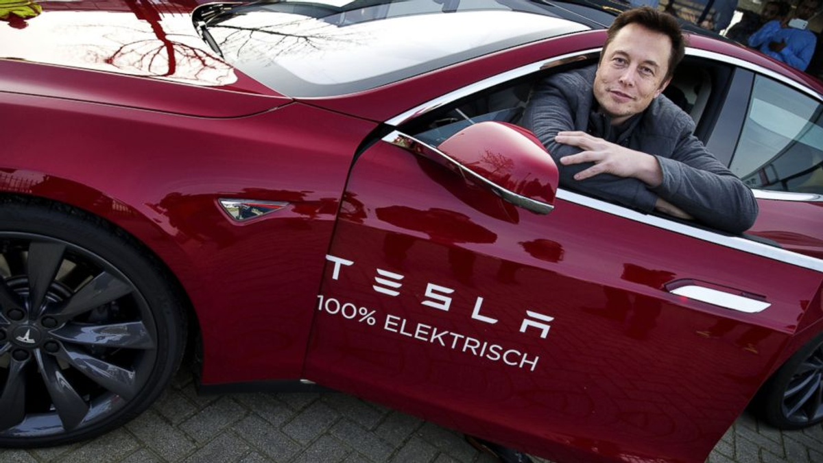 Musk in a Tesla auto