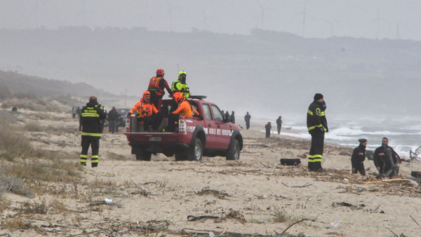 Rescuers arrive at the beach